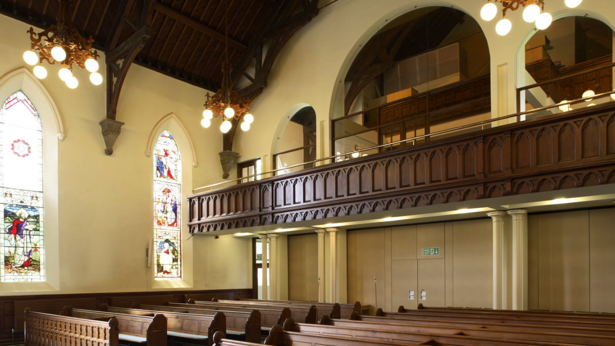 View of pews and the balcony
