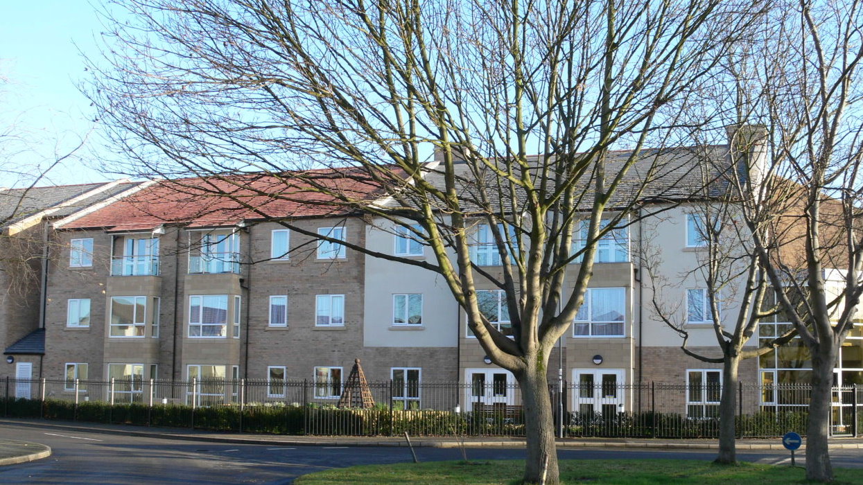 View of apartments with trees